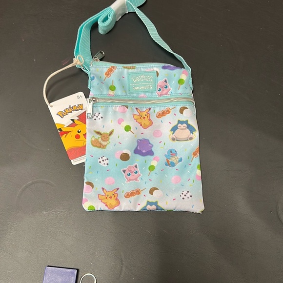 Loungefly Pokémon Treats Passport Crossbody Bag NWT
💙 - Picture 2 of 2